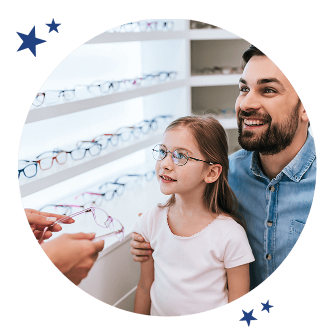 happy kid picking new glasses